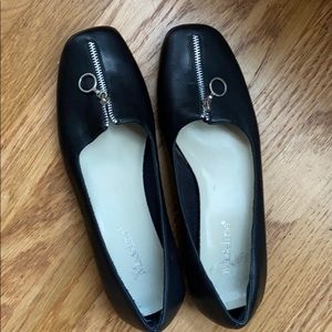 Black leather flats